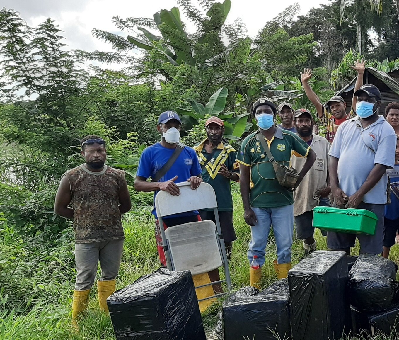 Group of health patrols standing together holding supplies