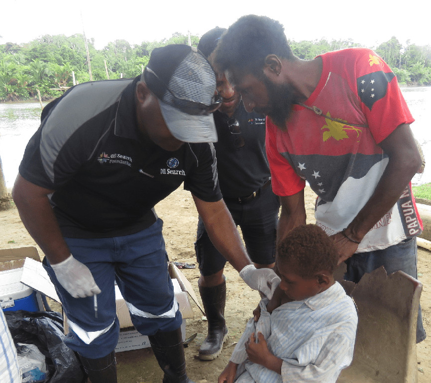 Child being administered vaccine
