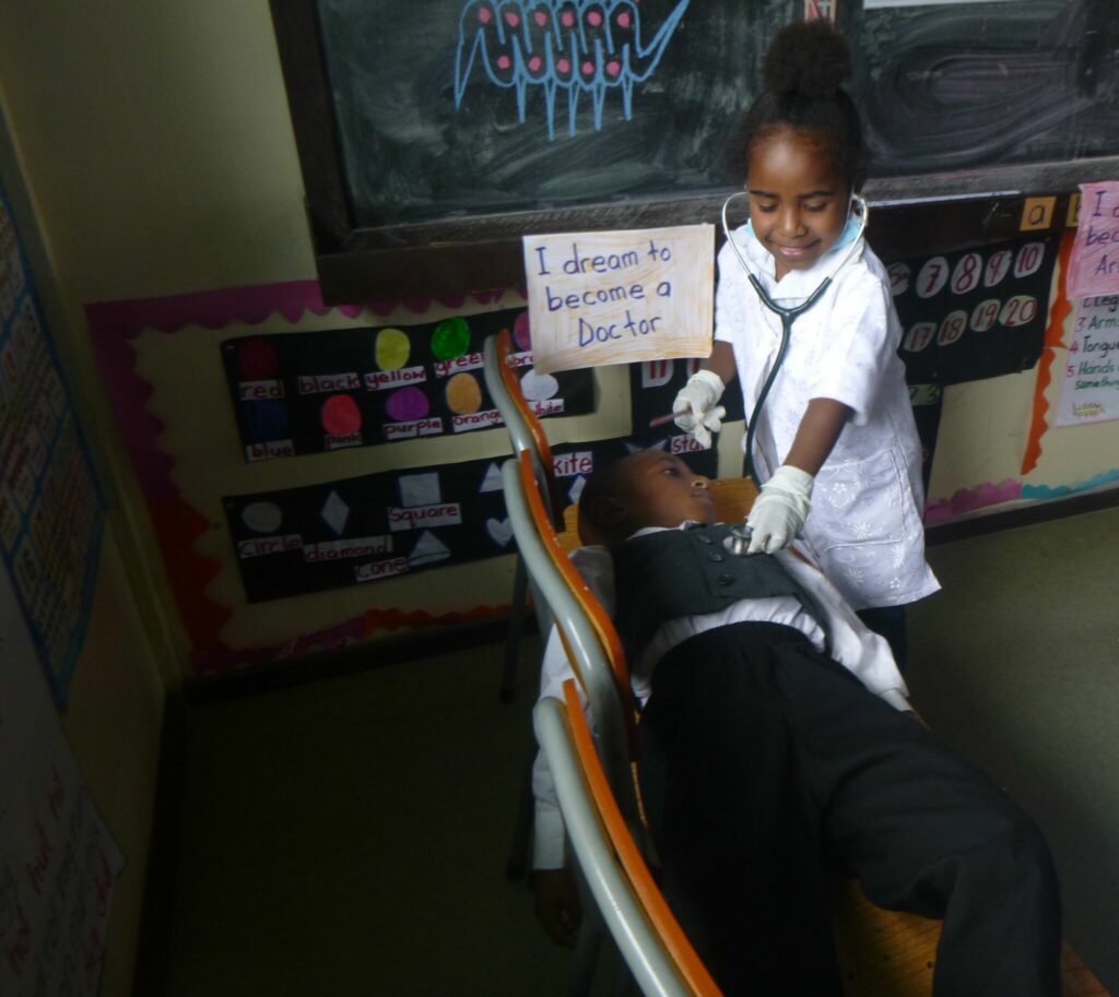 Two children playing as doctors